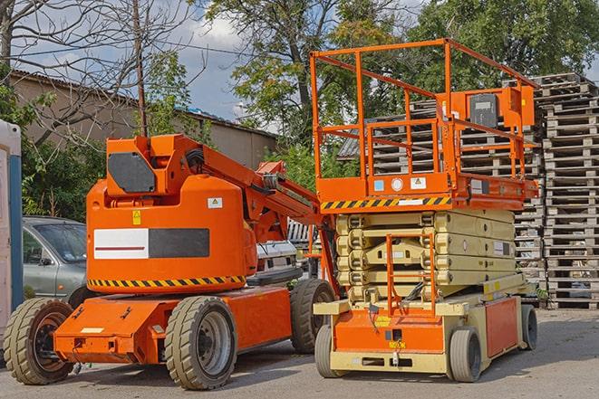 loading and unloading goods with a warehouse forklift in Newtonville, MA